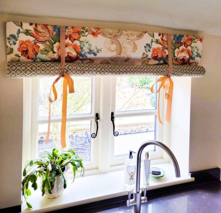 kitchen roman blind in mulberry fabric